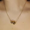 COLLIER ORNÉ DEUX SPHÈRES DORÉES