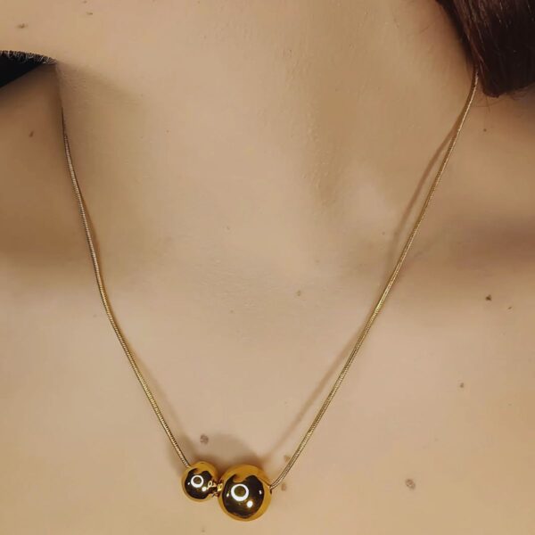 COLLIER ORNÉ DEUX SPHÈRES DORÉES