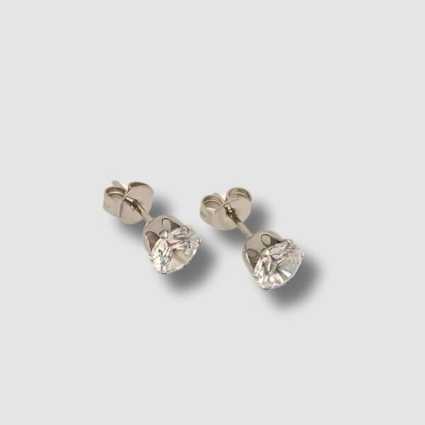 Clous d'oreilles point de Lumière